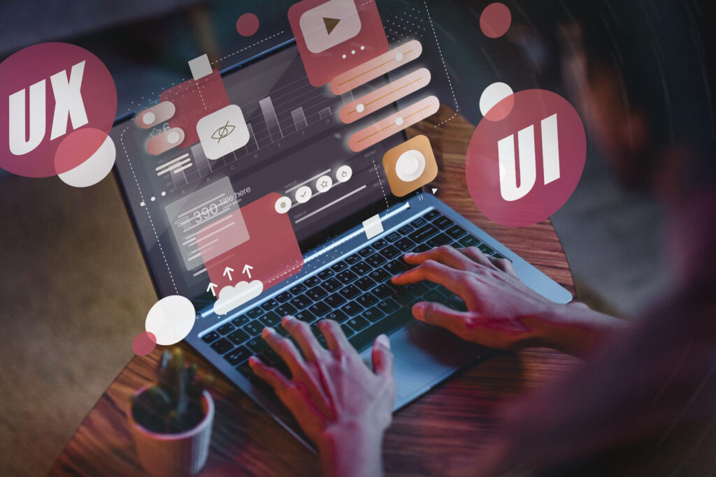 Laptop screen showing digital marketing analytics and icons, representing the best Website Design service in Siliguri